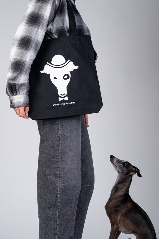 Schwarzer Jutebeutel „Dog Person“ neben einem Italienischen Windspiel im Sitzen.