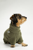 Load image into Gallery viewer, Dackel trägt Overall in Dark Olive aus weichem Teddy-Material
