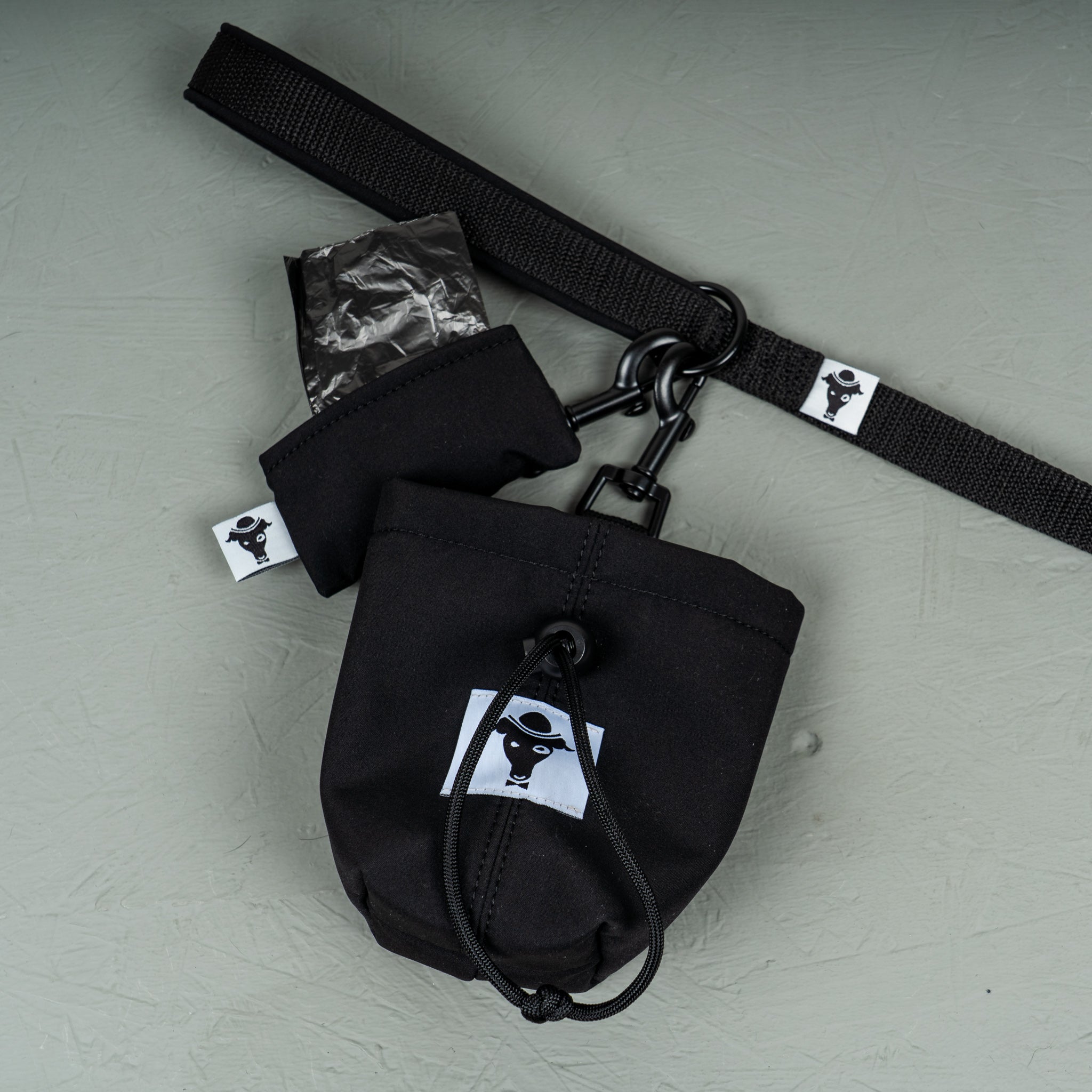 Softshell Kotbeutelhalter Schwarz