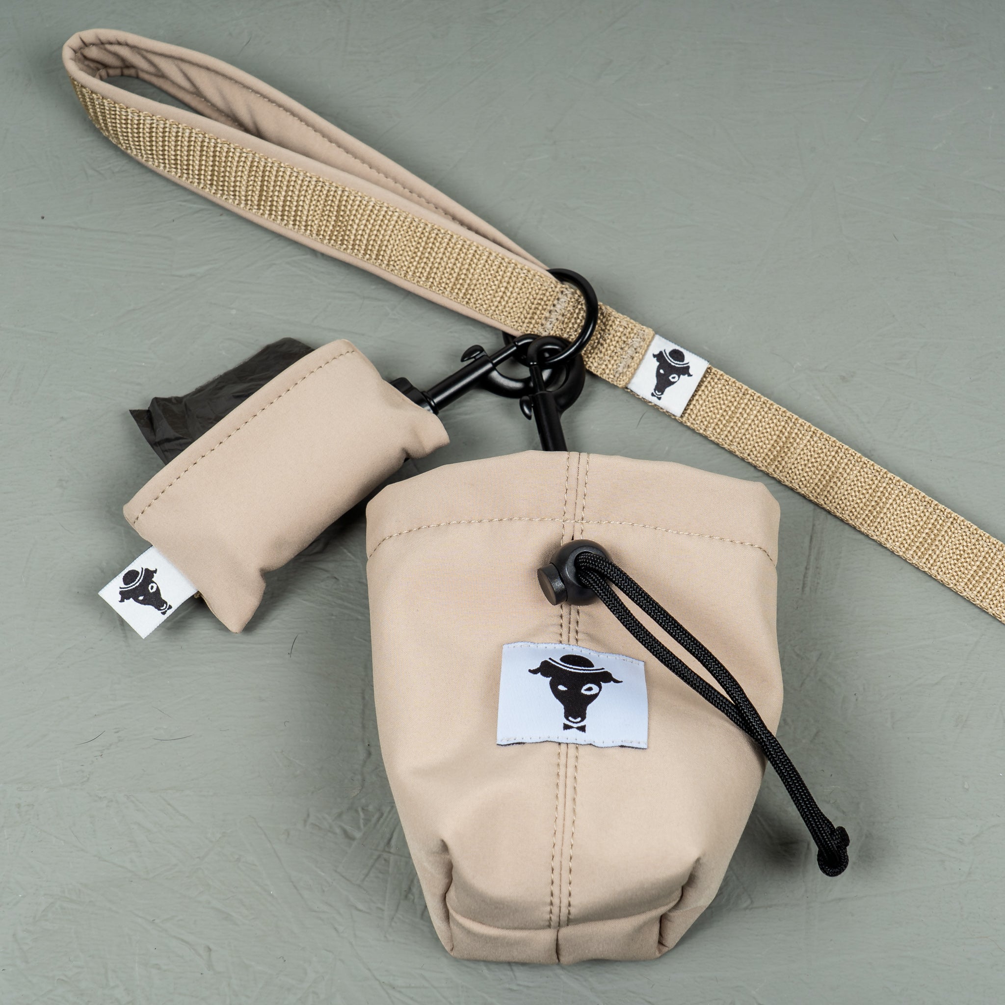 Softshell Kotbeutelhalter Sand